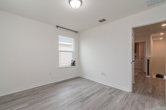 8298 Assumption Dr, San Antonio, TX 78254 - unfurnished room featuring light wood-style floors and baseboards