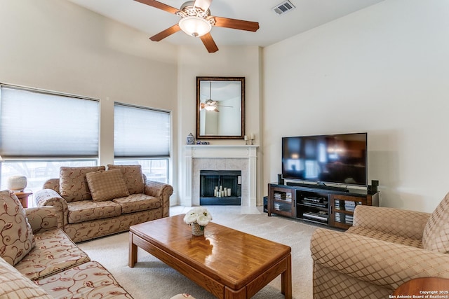 20927 Las Lomas Blvd, San Antonio, TX 78258 - living area with carpet floors, plenty of natural light, a ceiling fan, and a fireplace