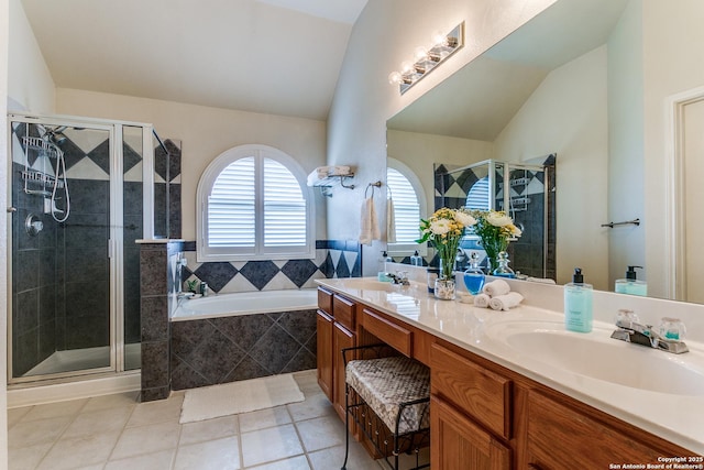 20927 Las Lomas Blvd, San Antonio, TX 78258 - bathroom with double vanity, tile patterned flooring, a stall shower, and lofted ceiling