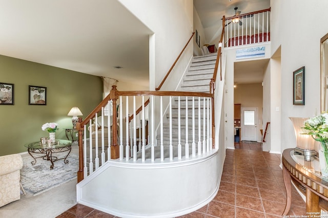 20927 Las Lomas Blvd, San Antonio, TX 78258 - stairway featuring a towering ceiling, tile patterned floors, and plenty of natural light