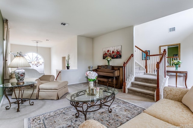 20927 Las Lomas Blvd, San Antonio, TX 78258 - living room featuring carpet, stairs, and a chandelier