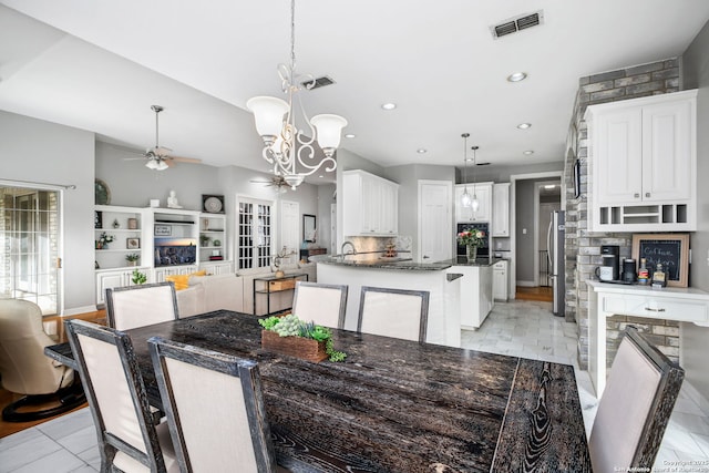 109 Trailcrest, Hollywood Park, TX 78232 - dining space with a ceiling fan, a chandelier, and recessed lighting