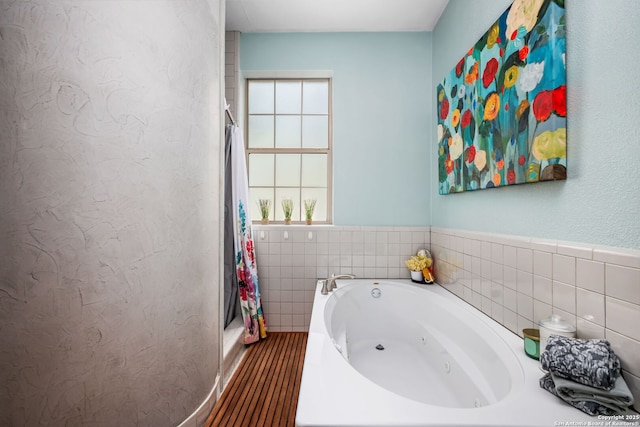 109 Trailcrest, Hollywood Park, TX 78232 - full bathroom with a jetted tub, curtained shower, and tile walls