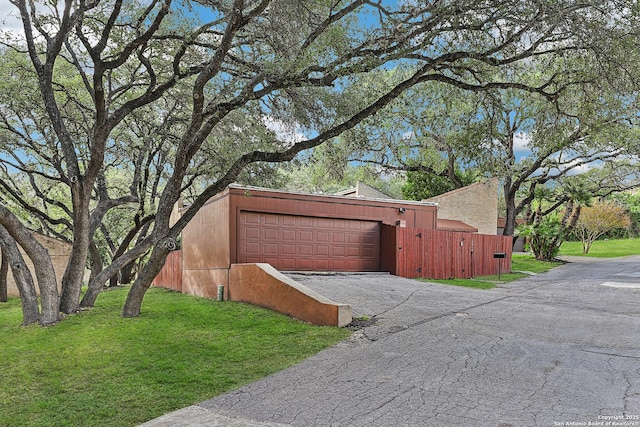12010 Arms Way, Live Oak, TX 78233 - garage featuring driveway