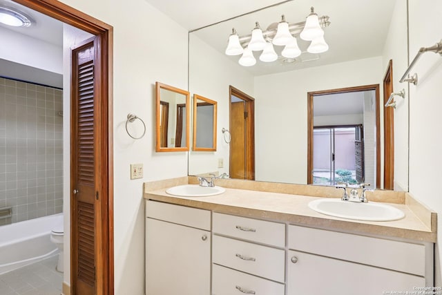 12010 Arms Way, Live Oak, TX 78233 - full bathroom with double vanity, tile patterned flooring, and tub / shower combination