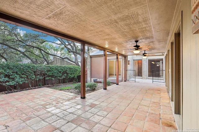 12010 Arms Way, Live Oak, TX 78233 - fenced backyard with a patio area, a ceiling fan, and an outdoor structure