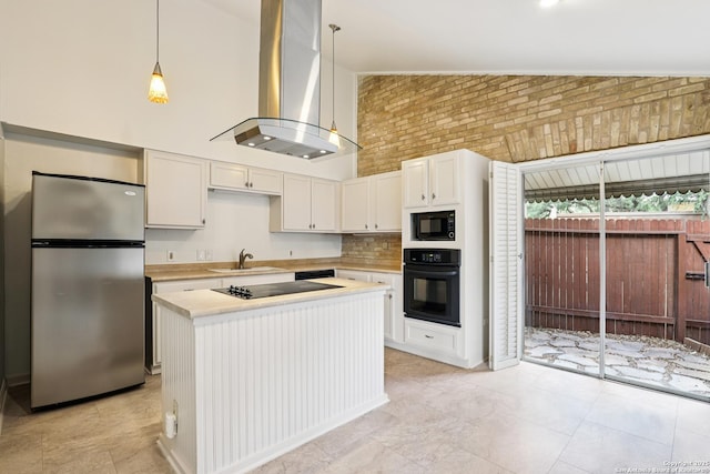 12010 Arms Way, Live Oak, TX 78233 - kitchen featuring black appliances, exhaust hood, light countertops, high vaulted ceiling, and a center island
