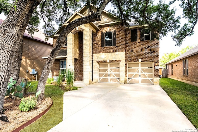 11406 Sawyer Vly, San Antonio, TX 78254 - view of front of house featuring brick siding, driveway, and a garage
