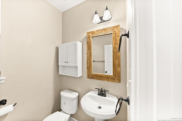 11406 Sawyer Vly, San Antonio, TX 78254 - half bath with toilet and a sink
