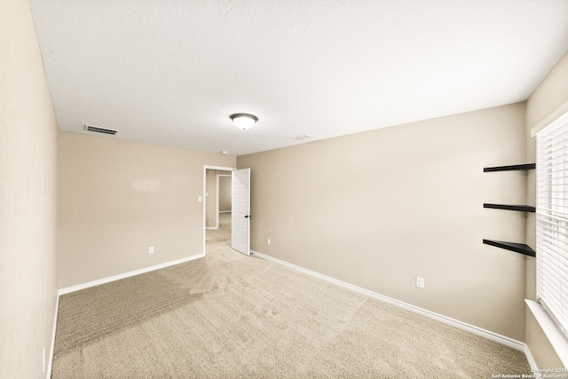 11406 Sawyer Vly, San Antonio, TX 78254 - spare room featuring light colored carpet and baseboards