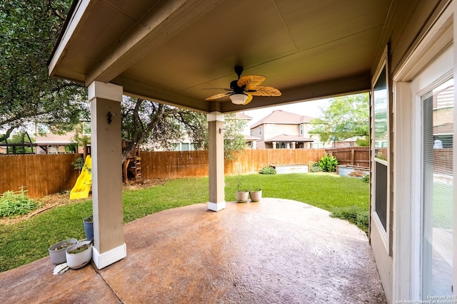 11406 Sawyer Vly, San Antonio, TX 78254 - fenced backyard featuring a patio area and a ceiling fan