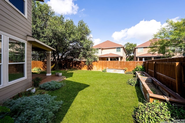 11406 Sawyer Vly, San Antonio, TX 78254 - fenced backyard with a garden