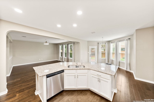 11406 Sawyer Vly, San Antonio, TX 78254 - kitchen featuring dishwasher, light stone countertops, open floor plan, white cabinets, and recessed lighting