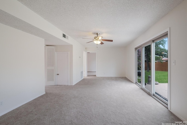 6403 Port Royal, San Antonio, TX 78244 - unfurnished room with carpet, a ceiling fan, and a textured ceiling