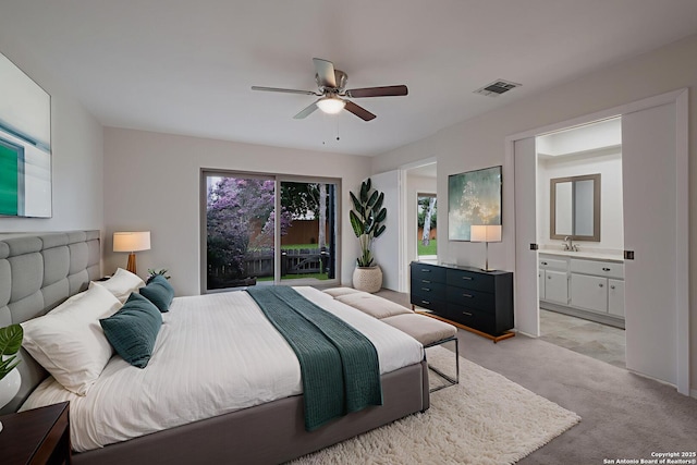 6403 Port Royal, San Antonio, TX 78244 - bedroom featuring light colored carpet, access to exterior, ensuite bath, and a ceiling fan