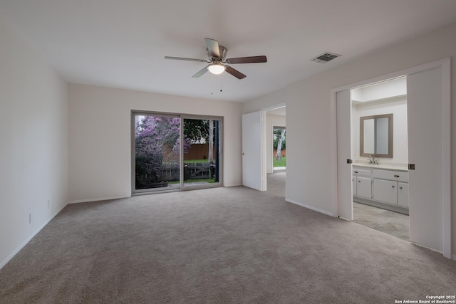 6403 Port Royal, San Antonio, TX 78244 - unfurnished bedroom featuring light colored carpet, access to outside, ensuite bathroom, and ceiling fan