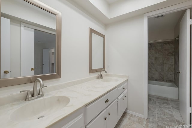 6403 Port Royal, San Antonio, TX 78244 - bathroom with double vanity and washtub / shower combination