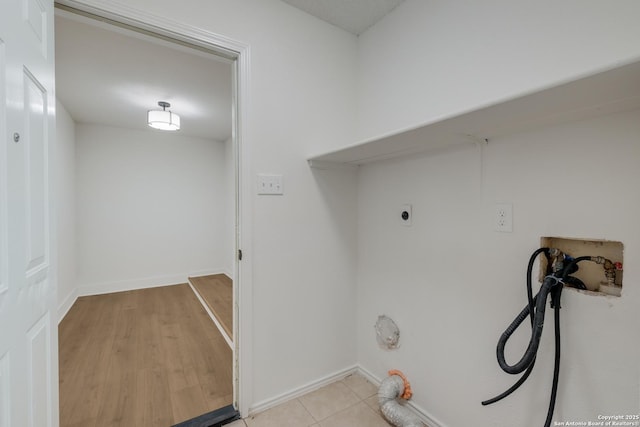4204 Golden Spice Dr, San Antonio, TX 78222 - laundry area featuring hookup for a washing machine and light wood finished floors