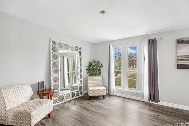 931 Republic Rd, New Caney, TX 77357 - sitting room with wood finished floors and baseboards