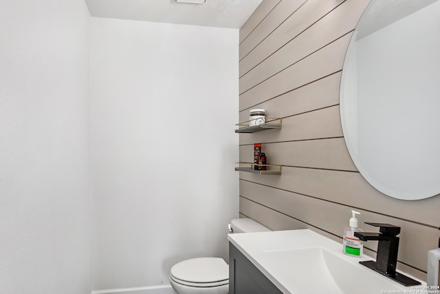 931 Republic Rd, New Caney, TX 77357 - bathroom with vanity and wooden walls