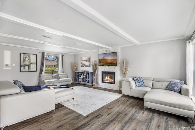 931 Republic Rd, New Caney, TX 77357 - living room with wood finished floors, crown molding, a high end fireplace, and beamed ceiling