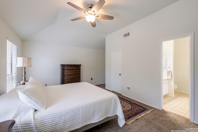 2516 Hidden Grv, Schertz, TX 78154 - bedroom with carpet floors, vaulted ceiling, ensuite bath, and a ceiling fan