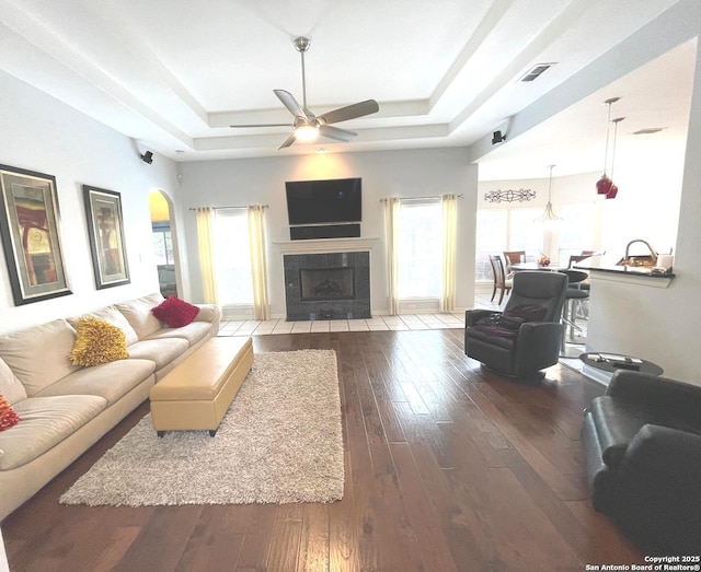 614 Slumber, San Antonio, TX 78260 - living room featuring a raised ceiling, hardwood / wood-style flooring, plenty of natural light, and a ceiling fan