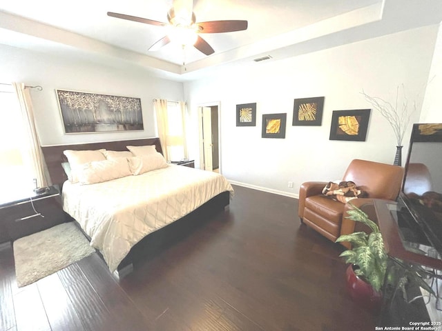 614 Slumber, San Antonio, TX 78260 - bedroom with a raised ceiling, wood finished floors, and a ceiling fan