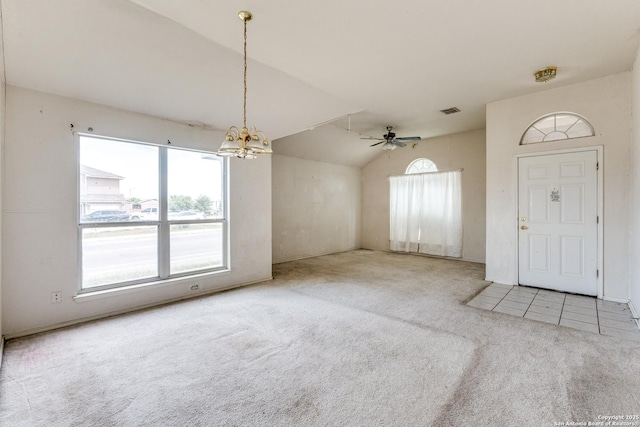 6051 Still Mdw, San Antonio, TX 78222 - carpeted entrance foyer with a chandelier, vaulted ceiling, a ceiling fan, and tile patterned flooring