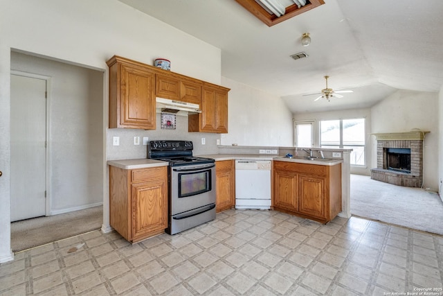 6051 Still Mdw, San Antonio, TX 78222 - kitchen with dishwasher, stainless steel electric range oven, under cabinet range hood, light flooring, and light countertops