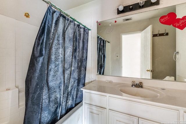 6051 Still Mdw, San Antonio, TX 78222 - bathroom with vanity and curtained shower