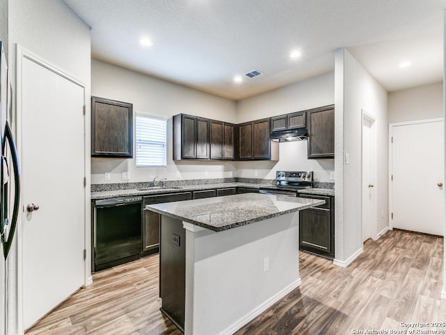 9410 Sandy Rdg, San Antonio, TX 78239 - kitchen featuring dishwasher, electric stove, under cabinet range hood, dark brown cabinets, and light wood-style flooring