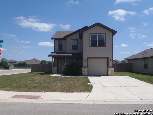 2201 Wirtz, Seguin, TX 78155 - view of front facade with driveway, stone siding, and a garage
