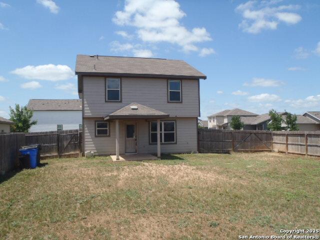2201 Wirtz, Seguin, TX 78155 - back of property featuring a fenced backyard