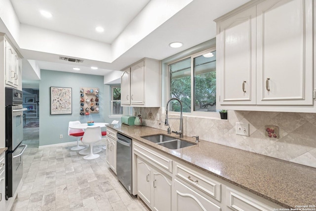 11214 Whisper Fls, San Antonio, TX 78230 - kitchen with stainless steel appliances, tasteful backsplash, light stone counters, and recessed lighting