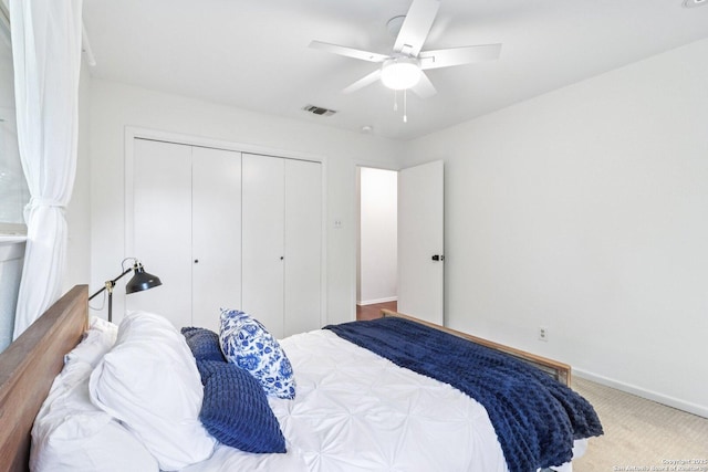 11214 Whisper Fls, San Antonio, TX 78230 - bedroom featuring a closet, ceiling fan, and carpet