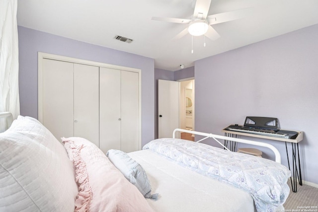 11214 Whisper Fls, San Antonio, TX 78230 - carpeted bedroom with a closet and a ceiling fan
