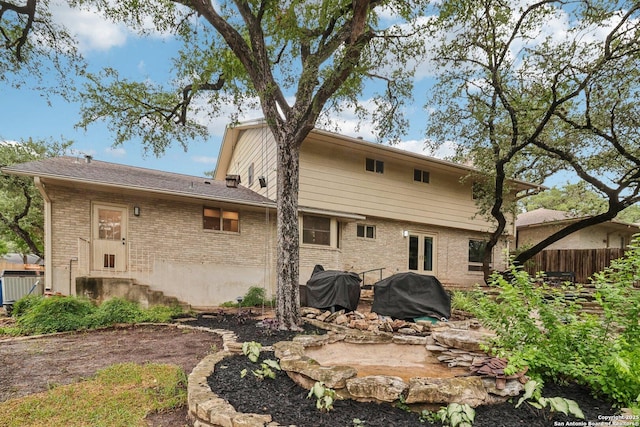 11214 Whisper Fls, San Antonio, TX 78230 - back of property with brick siding