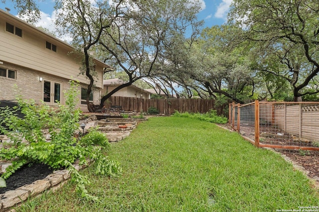 11214 Whisper Fls, San Antonio, TX 78230 - fenced backyard with a garden