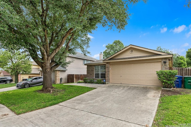 5330 Stormy Hls, San Antonio, TX 78247 - view of front facade with driveway, brick siding, a garage, and a chimney