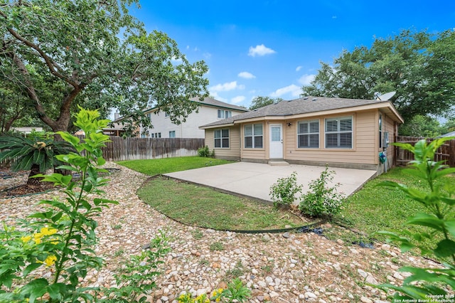 5330 Stormy Hls, San Antonio, TX 78247 - back of property with a patio and a fenced backyard