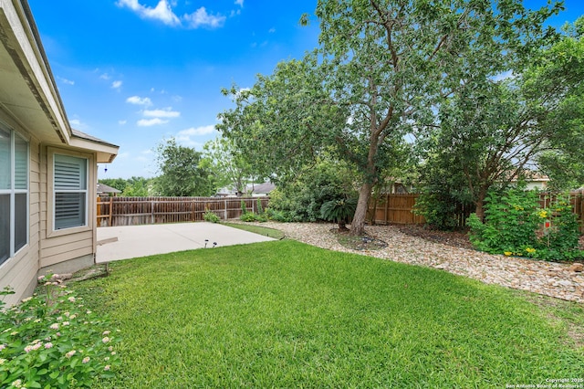 5330 Stormy Hls, San Antonio, TX 78247 - fenced backyard featuring a patio