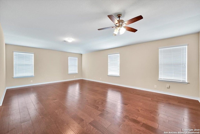 14055 Cremello Fls, San Antonio, TX 78254 - spare room with wood-type flooring and ceiling fan