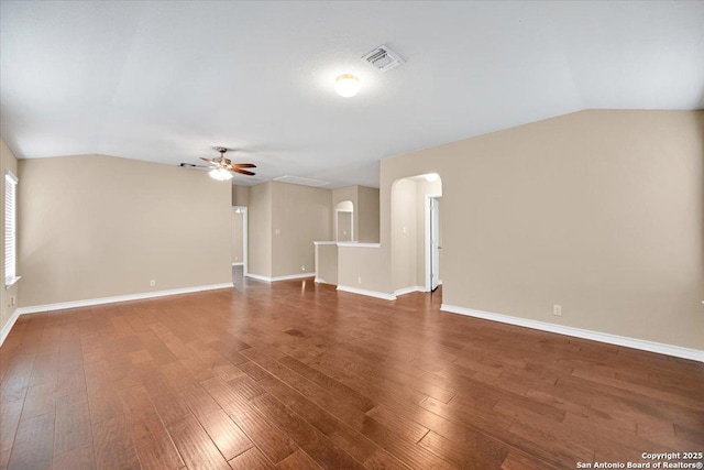 14055 Cremello Fls, San Antonio, TX 78254 - unfurnished room featuring vaulted ceiling, a ceiling fan, and wood finished floors