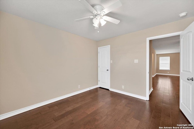 14055 Cremello Fls, San Antonio, TX 78254 - spare room featuring a ceiling fan, dark wood-style floors, and a smoke detector