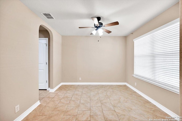 14055 Cremello Fls, San Antonio, TX 78254 - unfurnished room with ceiling fan and arched walkways