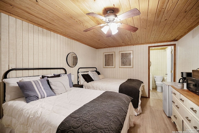 902 Harrison Prt, Oconnor, TX 77982 - bedroom featuring wooden ceiling, light wood-style flooring, crown molding, a ceiling fan, and ensuite bath