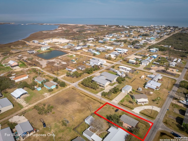 902 Harrison Prt, Oconnor, TX 77982 - aerial view of residential area with property boundaries highlighted and a large body of water