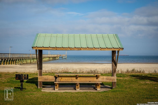 902 Harrison Prt, Oconnor, TX 77982 - view of property's community with a water view and a yard