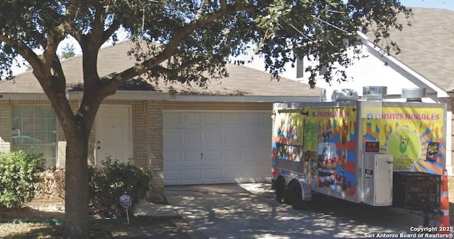 335 Silver Bit, San Antonio, TX 78227 - garage featuring driveway